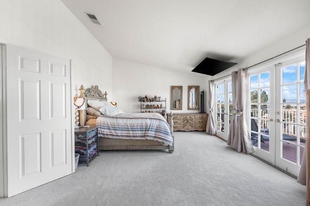 bedroom with access to exterior, french doors, carpet floors, and vaulted ceiling