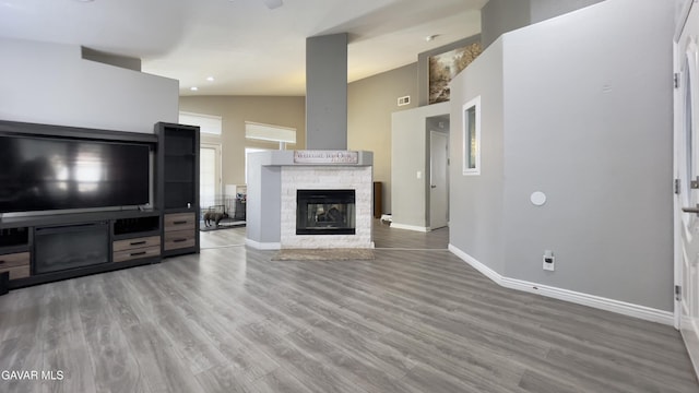 36726 Sulphur Springs Rd, Palmdale, CA 93552 - unfurnished living room with wood finished floors and a fireplace