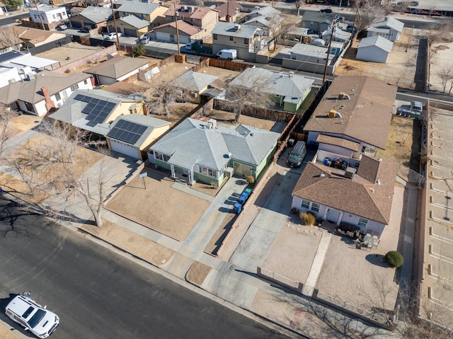 birds eye view of property with a residential view