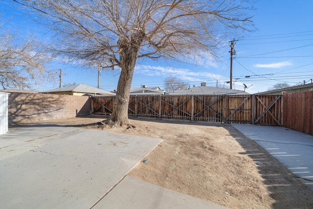 view of yard with a gate and fence