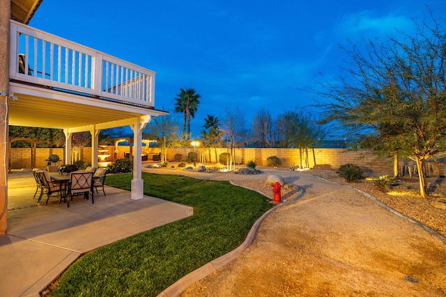 view of yard with a patio area and a fenced backyard