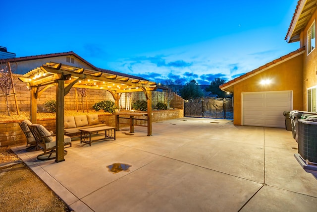 view of patio / terrace featuring a garage, a pergola, fence, an outdoor living space, and central AC