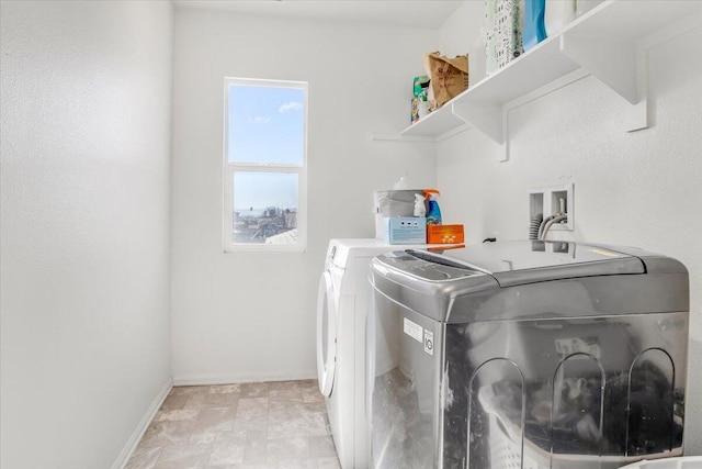 washroom with washer and clothes dryer