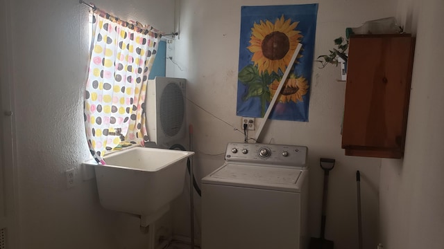 laundry room with washer / dryer and sink