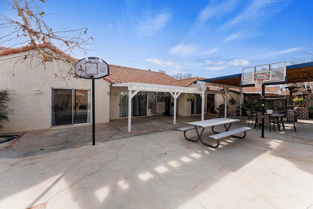 rear view of house with a patio