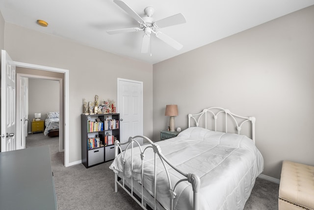 bedroom featuring carpet, baseboards, and ceiling fan