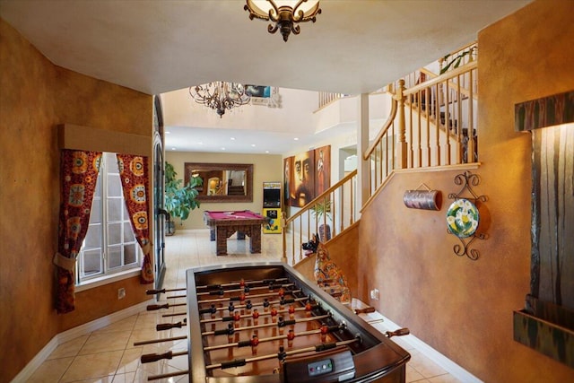41904 Tucson Ct, Palmdale, CA 93551 - foyer with stairs, tile patterned flooring, baseboards, a chandelier, and pool table