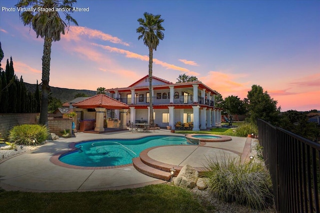 41904 Tucson Ct, Palmdale, CA 93551 - view of swimming pool featuring a patio area and a pool with connected hot tub