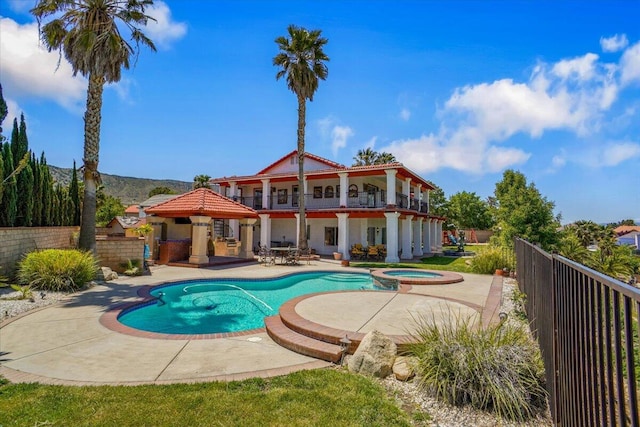 41904 Tucson Ct, Palmdale, CA 93551 - view of swimming pool with a patio and a pool with connected hot tub