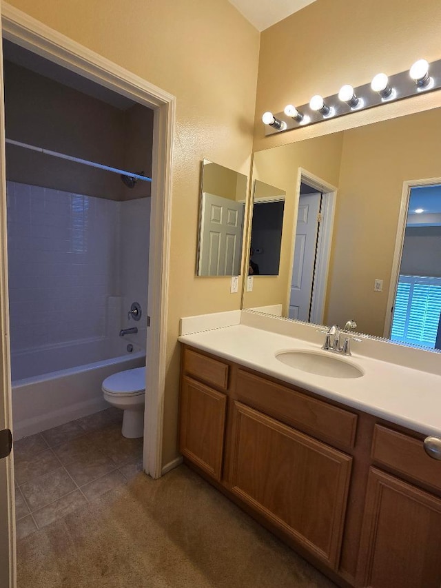 39294 Butler St, Palmdale, CA 93551 - bathroom with vanity, toilet, shower / bathtub combination, and tile patterned flooring