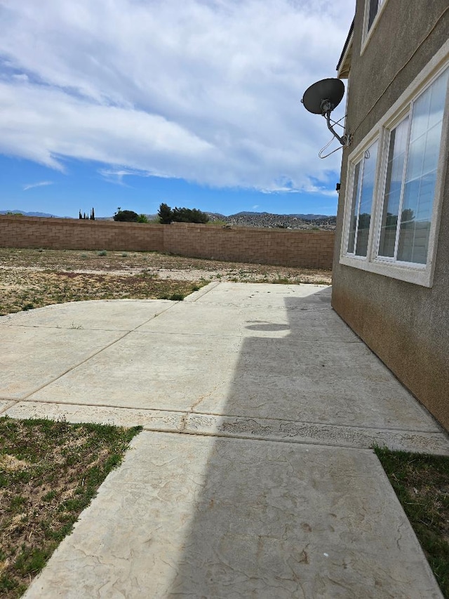 39294 Butler St, Palmdale, CA 93551 - fenced backyard featuring a patio area