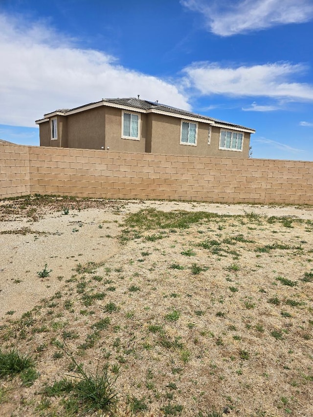 39294 Butler St, Palmdale, CA 93551 - view of home's exterior with stucco siding