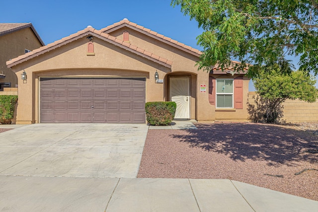 view of front of property featuring a garage