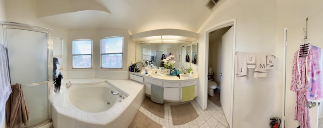 bathroom with a sink, tile patterned floors, a garden tub, and a shower stall