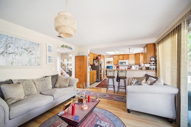 living room with light wood-type flooring