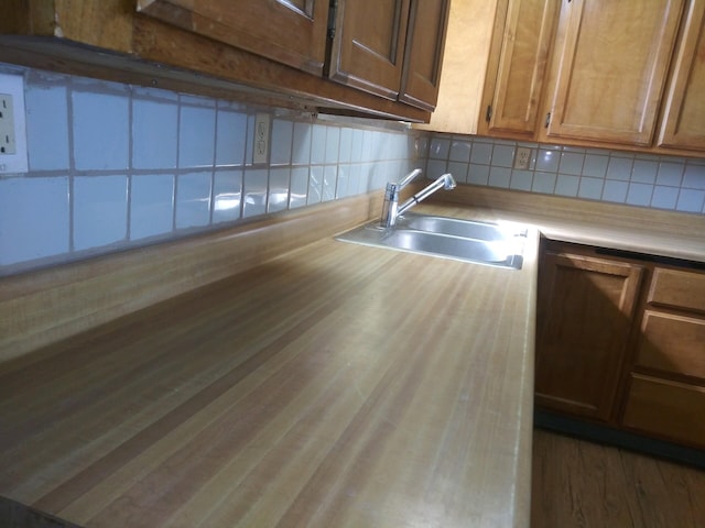 30650 233rd St, Llano, CA 93544 - kitchen featuring a sink, backsplash, light countertops, and wood finished floors