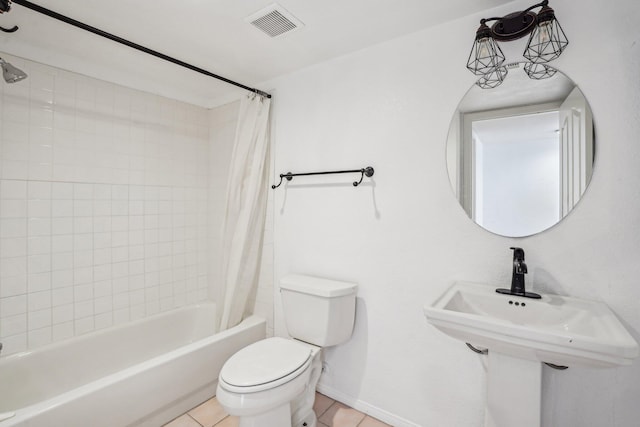 full bathroom featuring visible vents, tile patterned floors, baseboards, toilet, and shower / bathtub combination with curtain