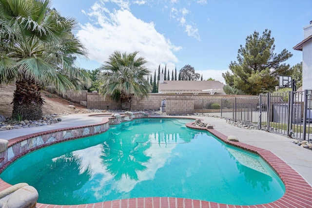view of pool featuring a fenced in pool and a fenced backyard