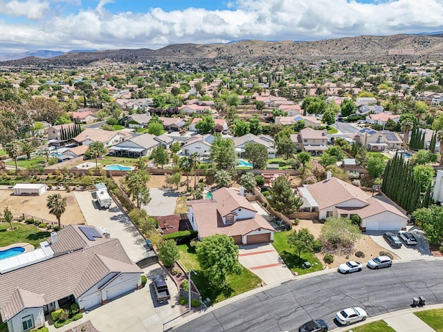 bird's eye view featuring a residential view and a mountain view