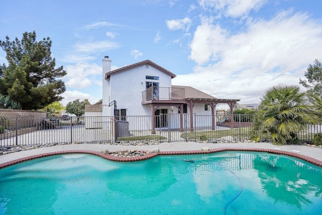 view of pool with fence, a fenced in pool, and a patio
