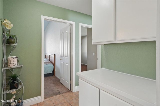 36525 Summerholly Cir, Palmdale, CA 93550 - laundry area featuring light tile patterned floors and light carpet