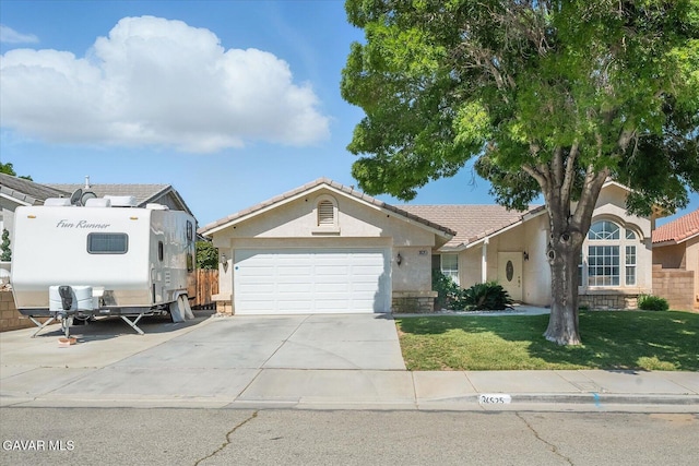 36525 Summerholly Cir, Palmdale, CA 93550 - view of front facade featuring stucco siding, a garage, concrete driveway, and a tile roof