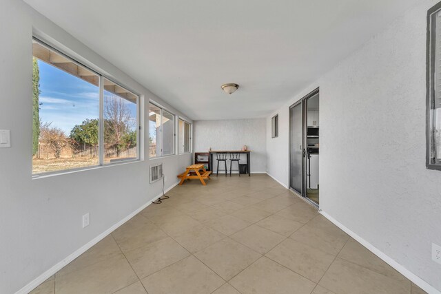 view of unfurnished sunroom