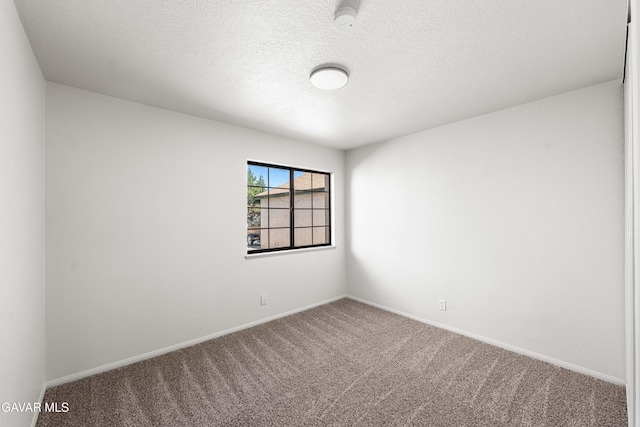 37632 E 15th St, Palmdale, CA 93550 - unfurnished room featuring carpet floors, a smoke detector, and a textured ceiling