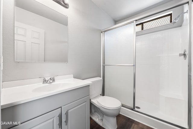 37632 E 15th St, Palmdale, CA 93550 - full bathroom with a stall shower, vanity, and wood finished floors