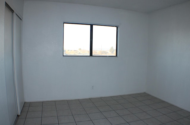 view of tiled spare room