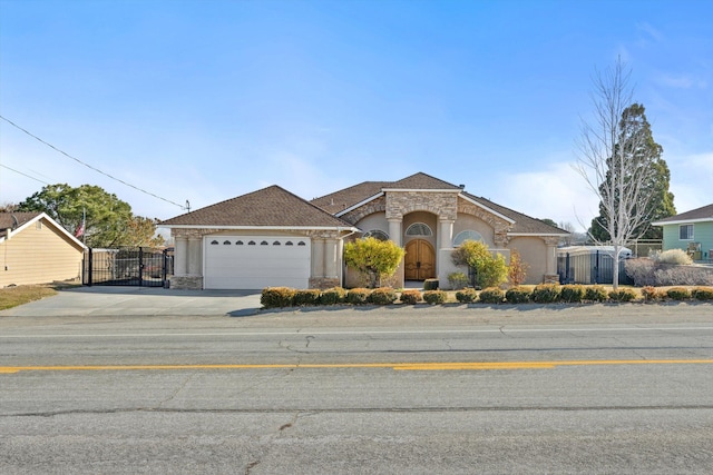 view of front of property featuring a garage