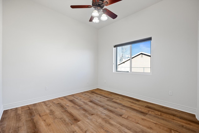 unfurnished room with hardwood / wood-style floors and ceiling fan