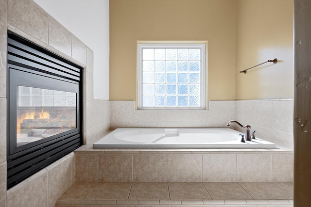 bathroom with tiled tub