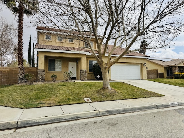 view of front of property featuring a garage, a front yard, fence, and stucco siding