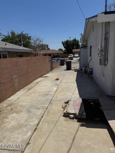45529 Sancroft Ave, Lancaster, CA 93535 - view of patio featuring a gate