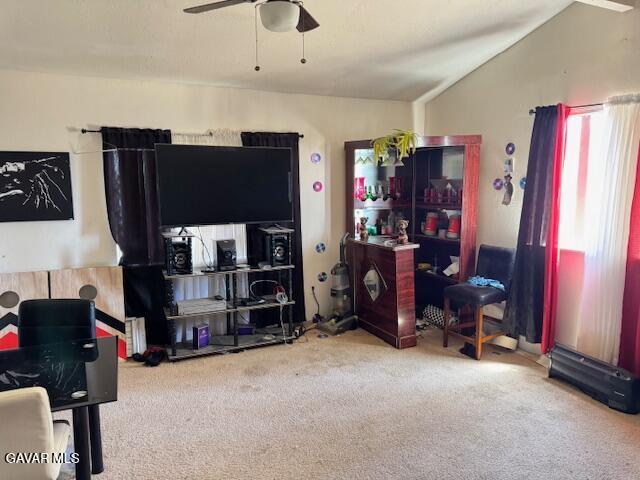 45529 Sancroft Ave, Lancaster, CA 93535 - carpeted living room featuring lofted ceiling and a ceiling fan