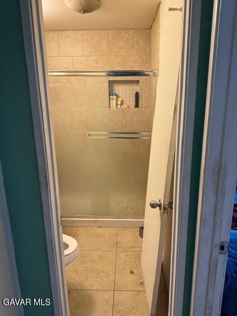 45529 Sancroft Ave, Lancaster, CA 93535 - bathroom featuring a stall shower and tile patterned floors