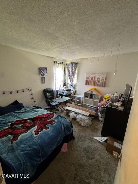 45529 Sancroft Ave, Lancaster, CA 93535 - bedroom with a textured ceiling and carpet