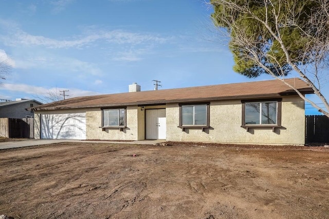 ranch-style home with a garage