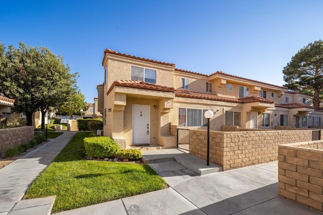 43441 W 30th St Unit 4, Lancaster, CA 93536 - doorway to property with stucco siding