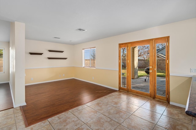 view of tiled spare room