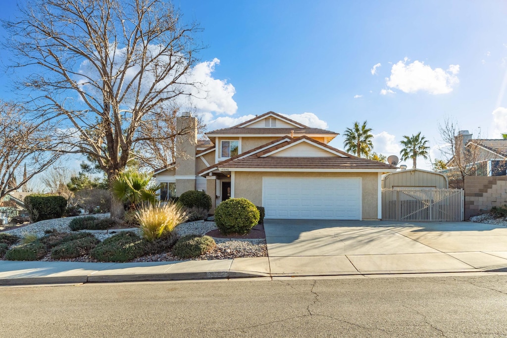 41646 Elsdale Pl, Quartz Hill, CA 93536 - view of front of house with a garage