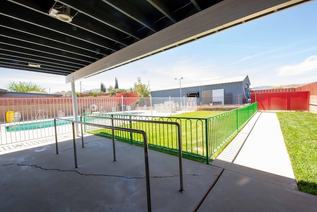 view of patio / terrace with a fenced in pool and fence private yard