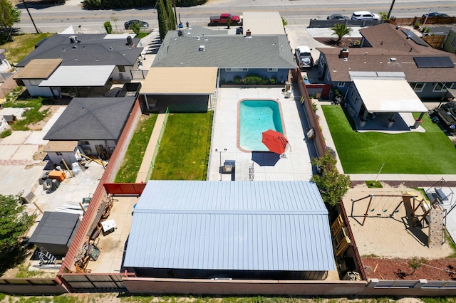 birds eye view of property with a residential view