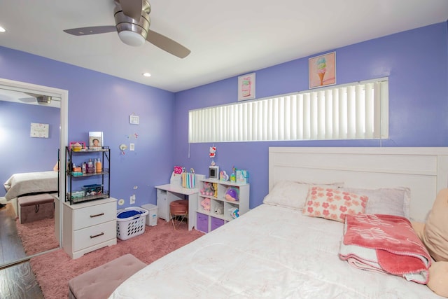 carpeted bedroom with ceiling fan and recessed lighting