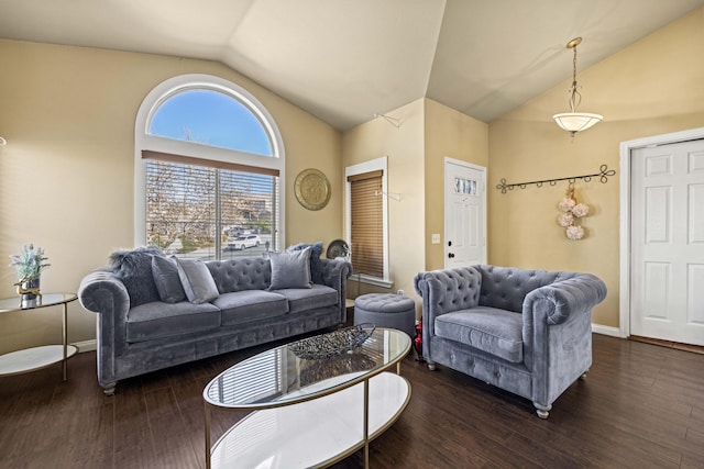 living room featuring dark hardwood / wood-style floors and lofted ceiling