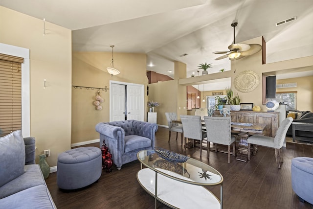 living room featuring ceiling fan, high vaulted ceiling, and dark hardwood / wood-style floors