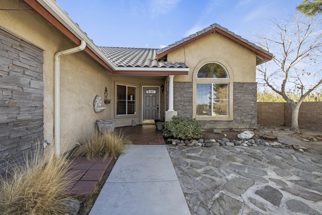 property entrance with a patio