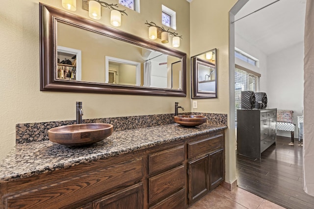 bathroom featuring tile patterned floors and vanity