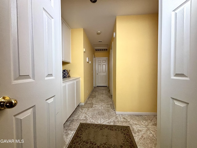 1816 Orange St, Rosamond, CA 93560 - hallway with light tile patterned floors and baseboards
